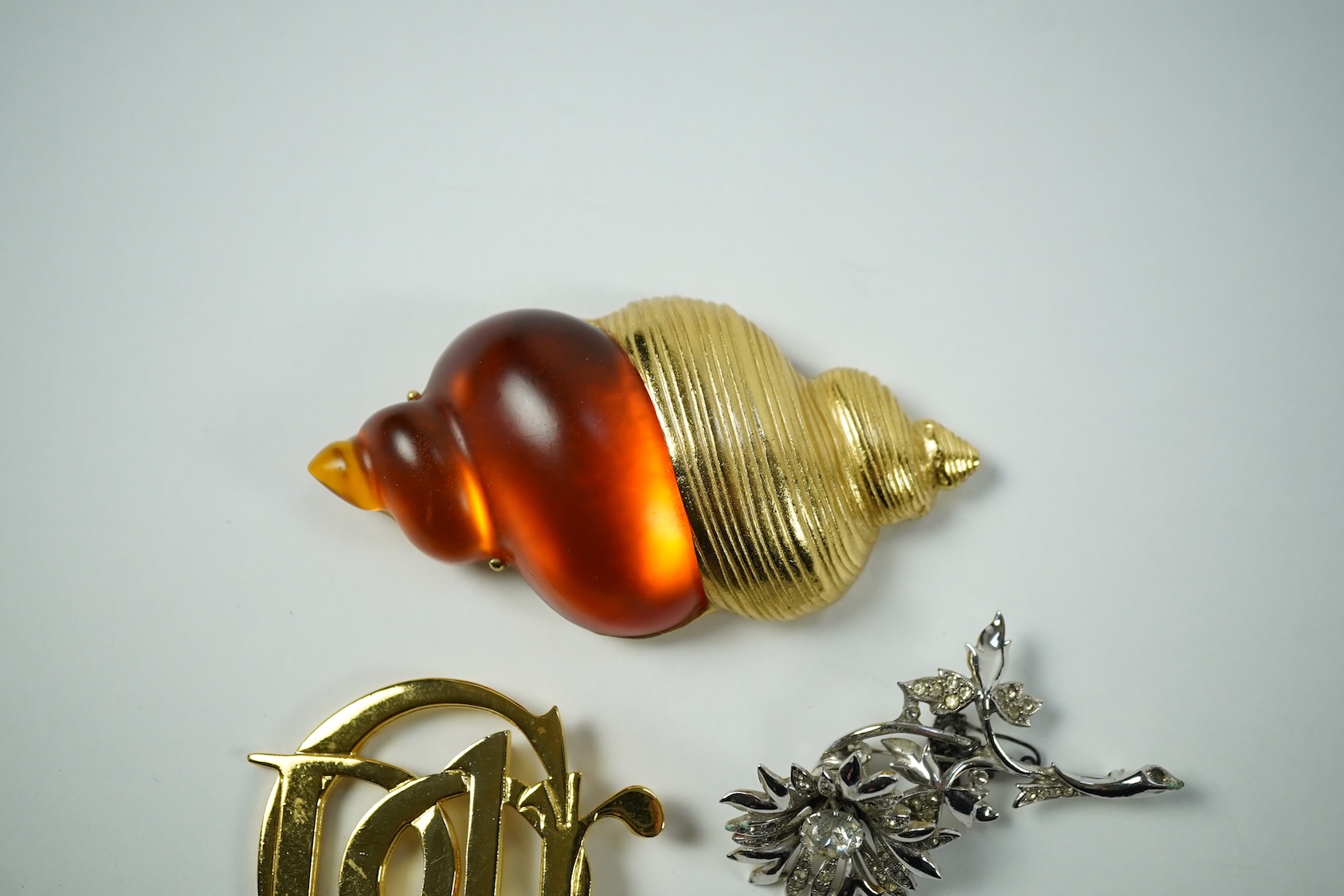 Three Christian Dior costume jewellery brooches